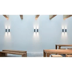 FLOS Clessidra 20° vägglampa, mörkbrun