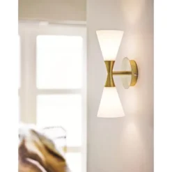 Herstal Harlekin vägglampa Duo mässing E14